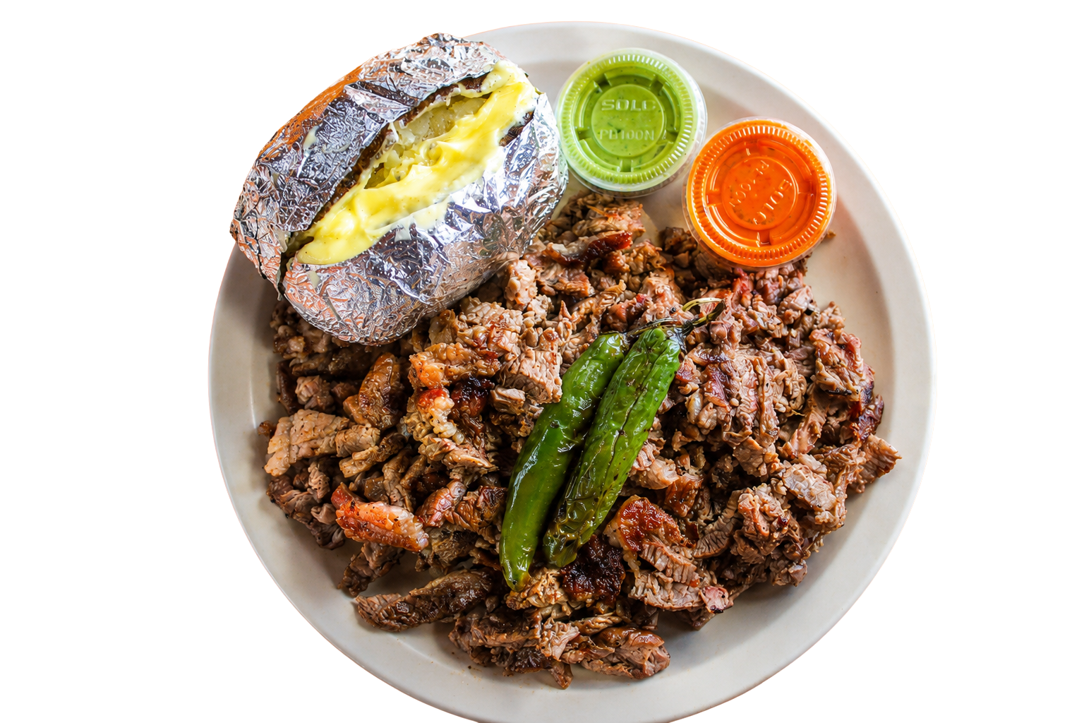 Carne asada con papa, salsas y chile